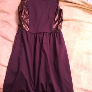 Sleeveless blue and black dress